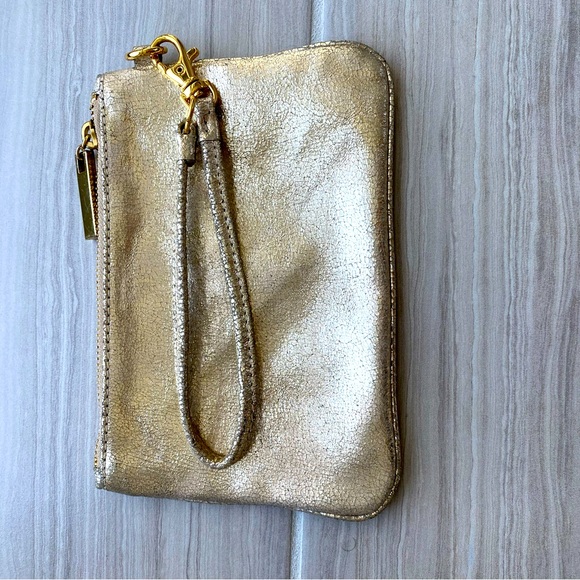 Tory Burch Metallic distressed Gold leather wristlet. - Picture 5 of 9